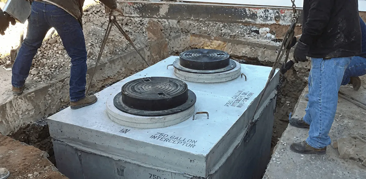 Grease trap installation for a commercial property drainage system in Lowell, MA