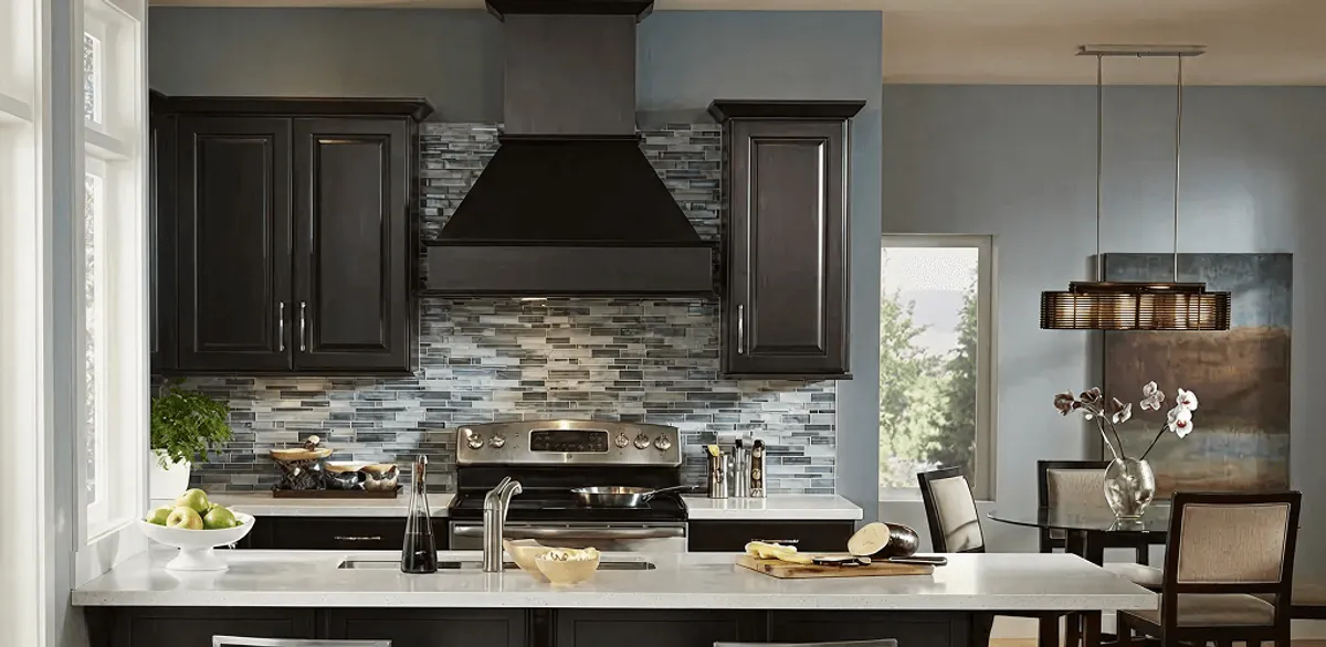 Kitchen cabinet painting and refinishing in a modern kitchen in Lowell, MA