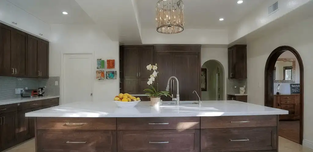 Cabinet refacing project with updated kitchen cabinets and island in Lowell, MA